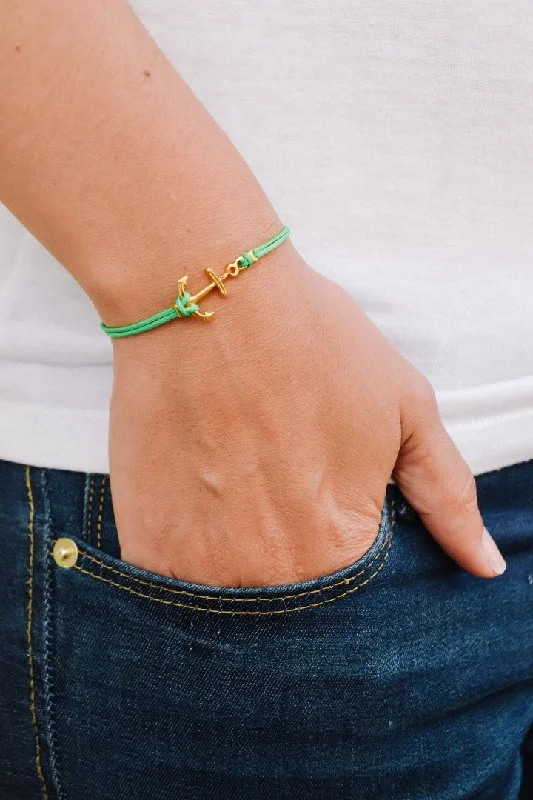 Gold anchor bracelet for women, green cord, nautical beach jewelry