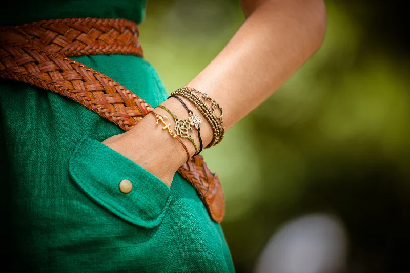 Brown bracelet with gold anchor charm