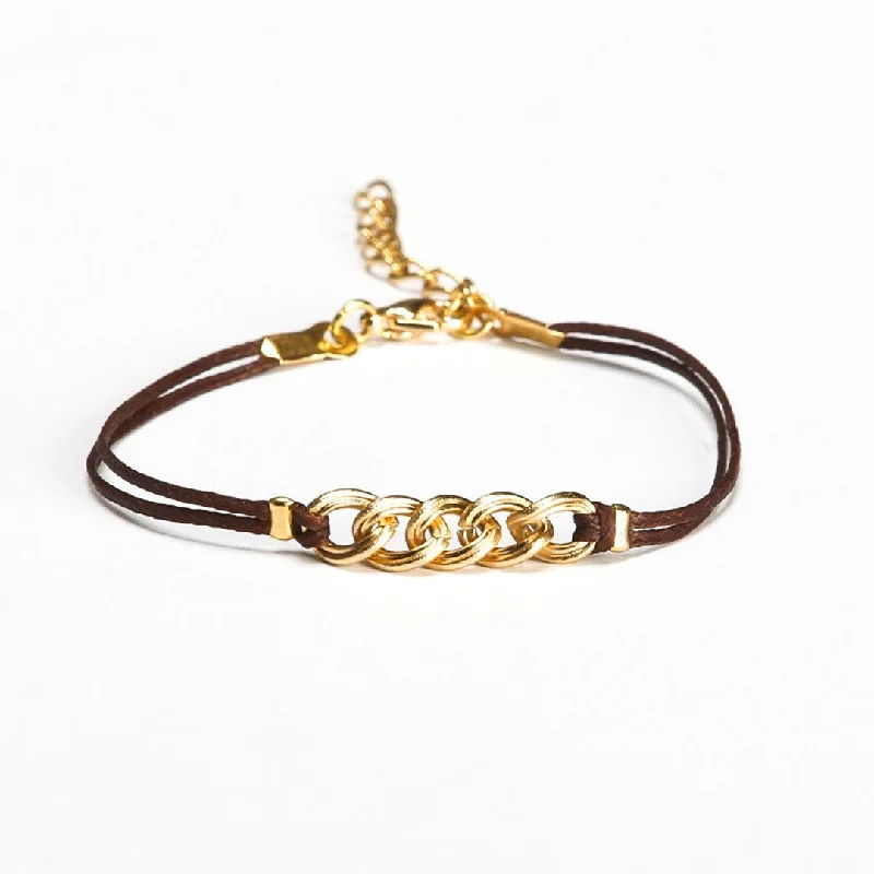 Brown cord bracelet with a gold chunky chain