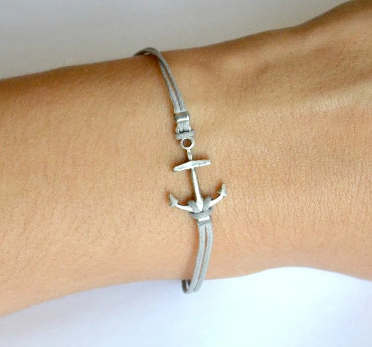 Cord bracelet with silver plated anchor charm, gray string