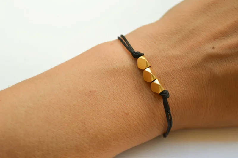 Gold nuggets beads bracelet. black cord, gift for her