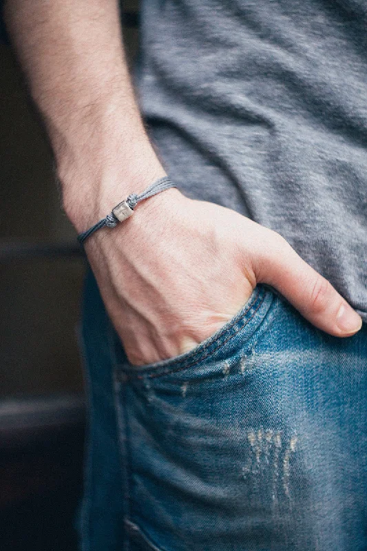 Men's bracelet with a silver tube bead and a gray cord, jewelry for man