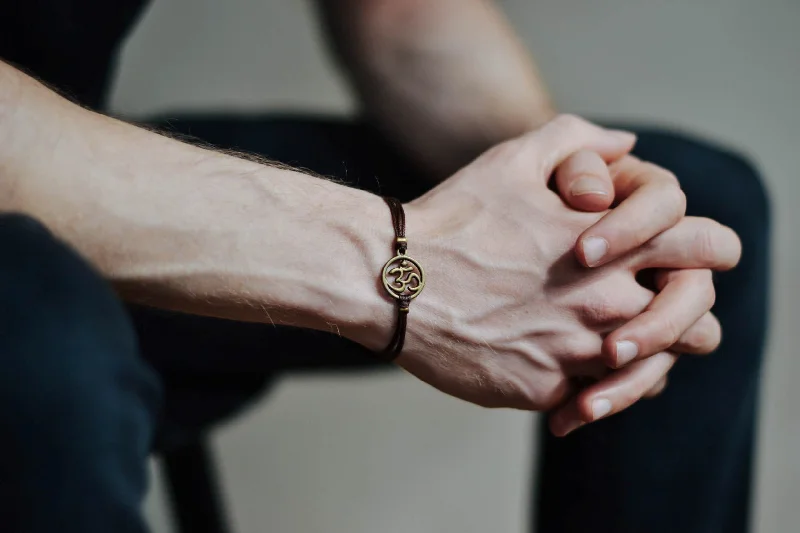 Men's bracelet with antique bronze Om charm, brown cord, fathers day gift for him