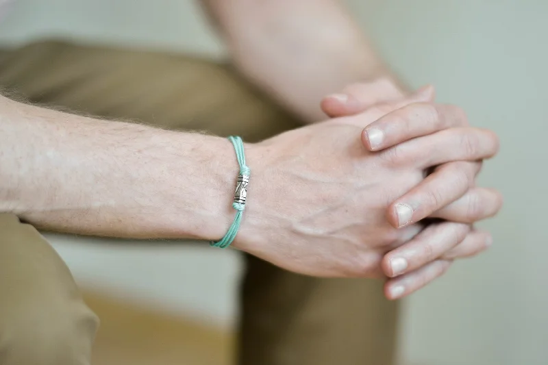 Turquoise cord bracelet for men, silver tube charm for him