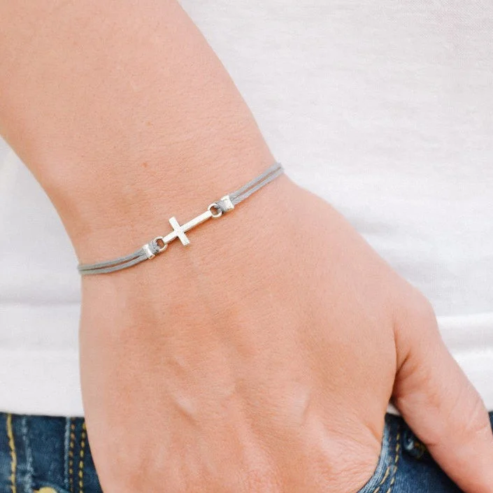 Women bracelet with silver cross charm, gray cord, Christian gift for her