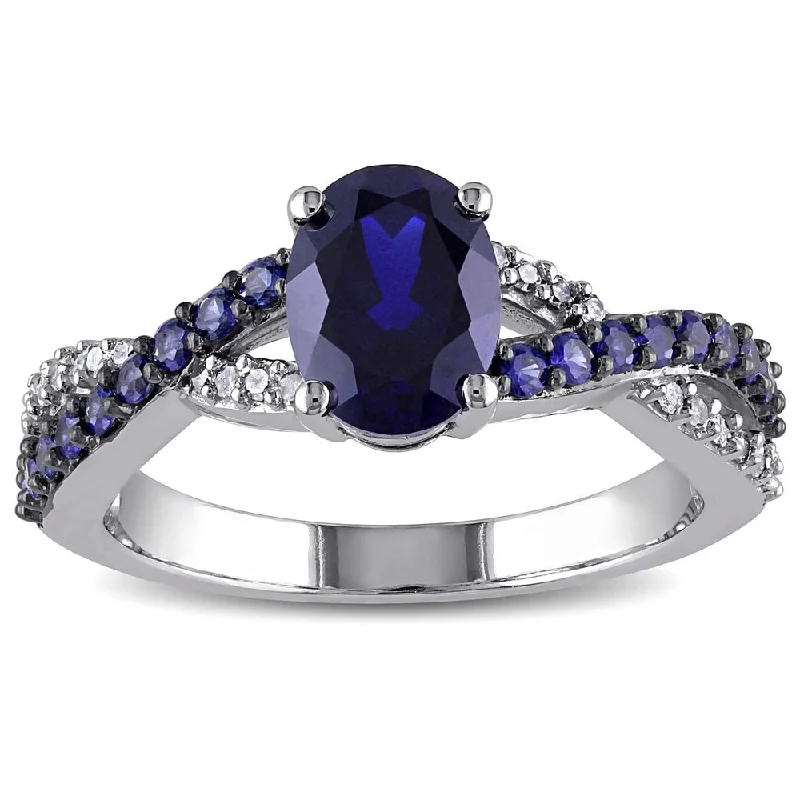 Miadora 10k White Gold Created Blue Sapphire and 1/10ct TDW Diamond Ring (H-I, I2-I3)